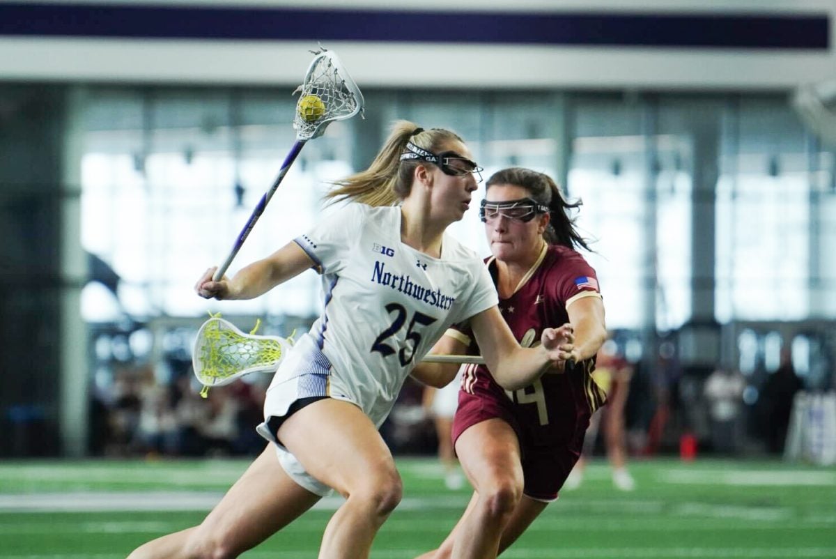 Junior attacker Madison Taylor takes the ball toward the goal in No. 2 Northwestern’s Saturday loss to No. 1 Boston College.